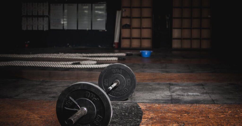 A lone barbell rests in an empty, dimly lit gym, emphasizing strength and solitude.
